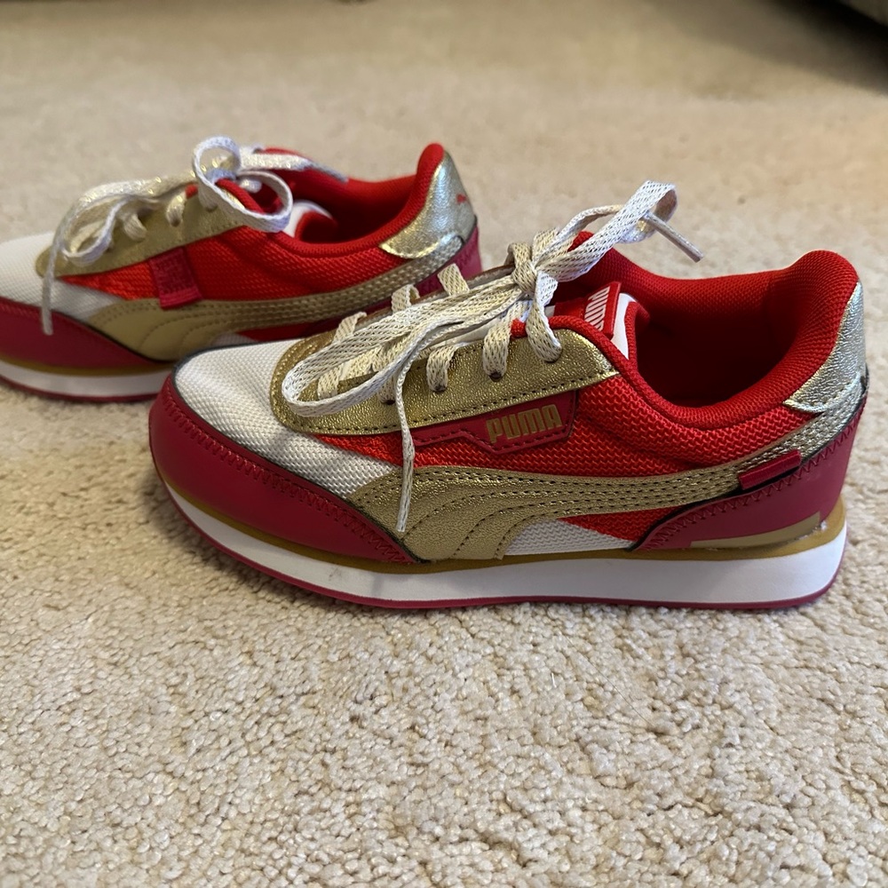 Kids Puma Red and Gold Sneakers